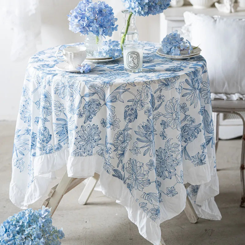 Coton tablecloth with blue embroidery and ruffles