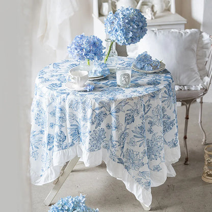 Coton tablecloth with blue embroidery and ruffles